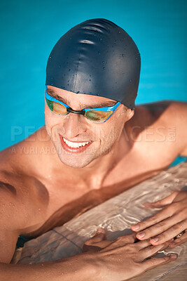 Buy stock photo Shot of a handsome young male athlete swimming in an olympic-sized pool