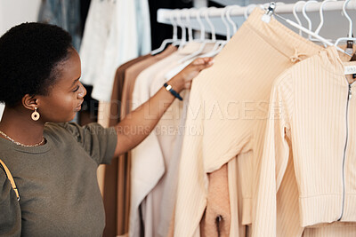 Buy stock photo Fashion, shopping and choice with black woman in boutique  for luxury, sale and retail. Store, product and consumerism with female customer buying in mall for shopaholic, purchase and clothes