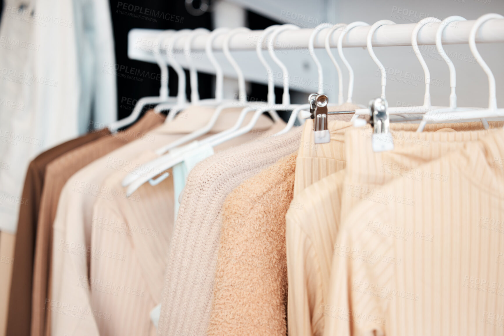 Buy stock photo Retail, hanger and clothing in store, fashion and boutique for sale for designer garments. Rack, fabric and casual wardrobe outfit choice, rail and purchase or shop for pastel discount material