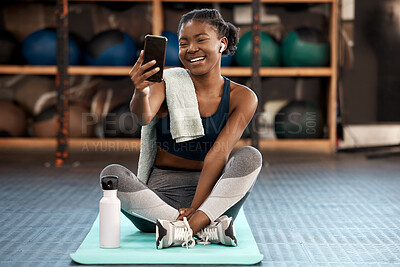 Buy stock photo Phone, selfie and black woman fitness influencer on social media on a cellphone during workout or exercise in a gym. Health, wellness and young person or athlete happy online, internet or web