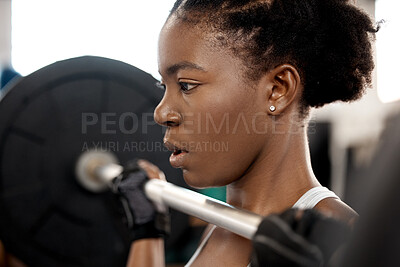 Buy stock photo Face, weightlifting and barbell with black woman in gym for workout, strong and muscle. Health, challenge and exercise with female bodybuilder and weights for focus, performance and commitment