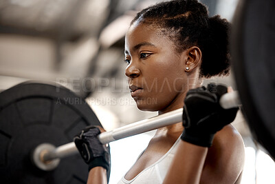 Buy stock photo Focus, weightlifting and barbell with black woman in gym for workout, strong and muscle. Health, challenge and exercise with female bodybuilder and weights for fitness, performance and commitment