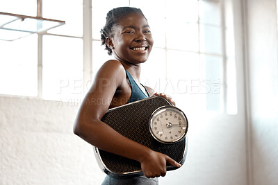 Buy stock photo Black woman, portrait and scale to measure in gym, fitness results and proud of weight loss. Female person, happy and smile for size progress or athlete for bmi confidence, cardio and girl training