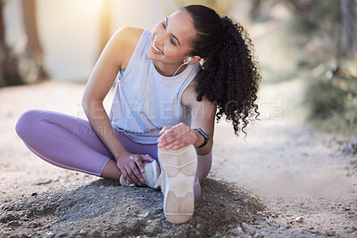 Buy stock photo Happy woman, fitness and stretching body in nature for running, exercise or workout outdoors. Fit, active or sporty female person in warm up leg or foot stretch for exercising or training in forest