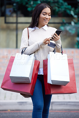 Buy stock photo Shopping, retail and woman with phone in city for sale, discount and bargain notification. Fashion store, mall and happy female person on smartphone for purchase, buying and promotion news online