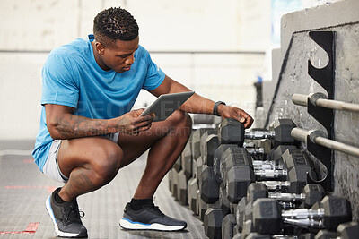 Buy stock photo Check list, man with a tablet and at the gym checking weights equipment. Fitness or workout, exercise or health wellness  and African male worker with smartphone working for inventory training