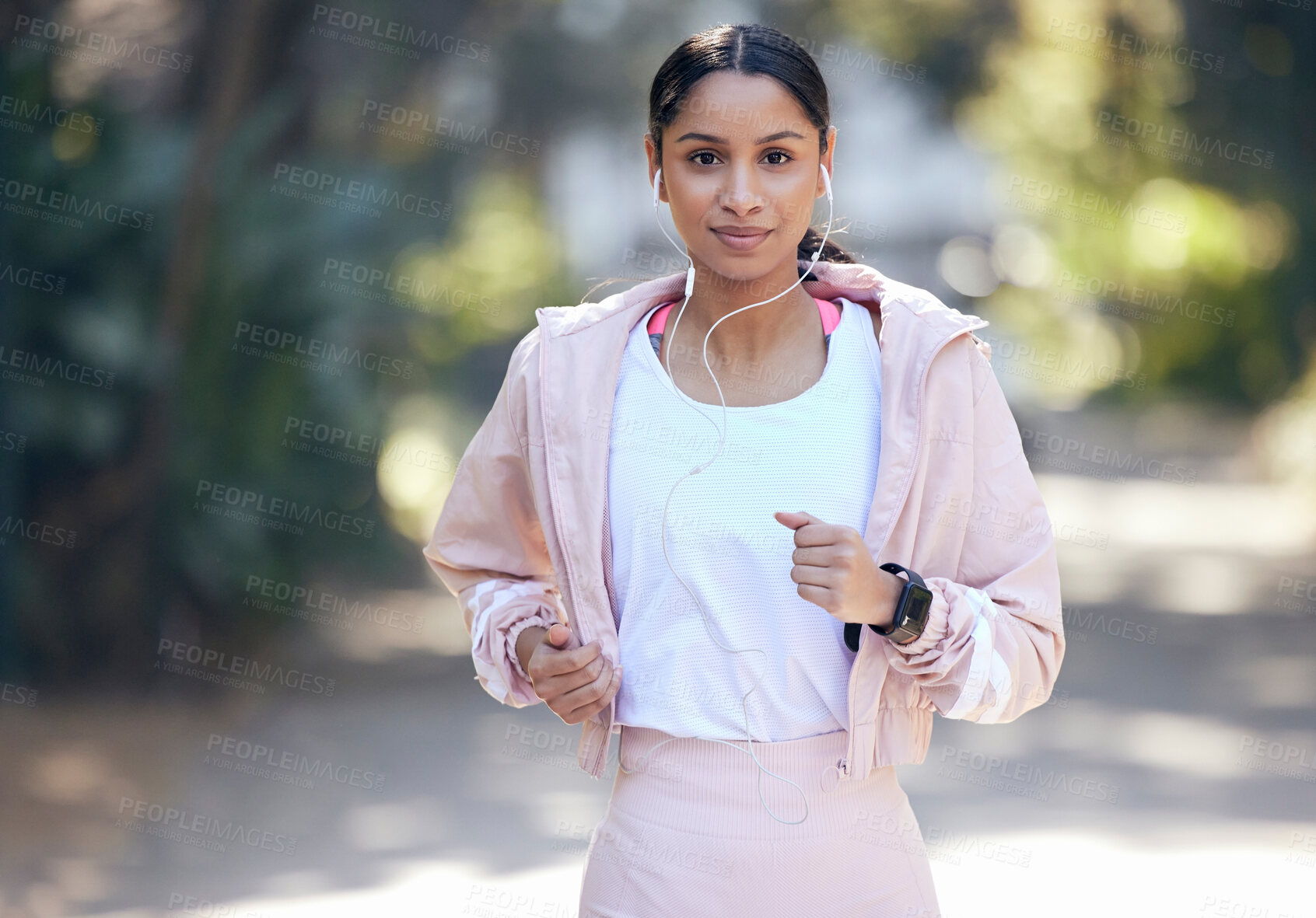 Buy stock photo Portrait, woman and running outdoor for fitness, workout and exercise with smile as routine. Runner, female person and training for physical strength, wellness and mental health with sports in nature