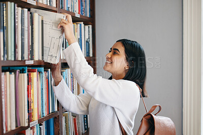 Buy stock photo Knowledge, woman and student in library, searching and school with education, excited and studying. Happy person, college and girl with novel, literature and bookshelf with scholarship and university