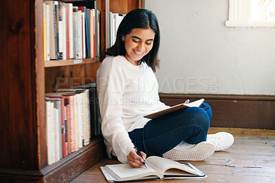 Buy stock photo Research, woman and student in library, searching and school with education, studying and knowledge. Person on the floor, college or girl with novel, university or bookshelf with scholarship or notes