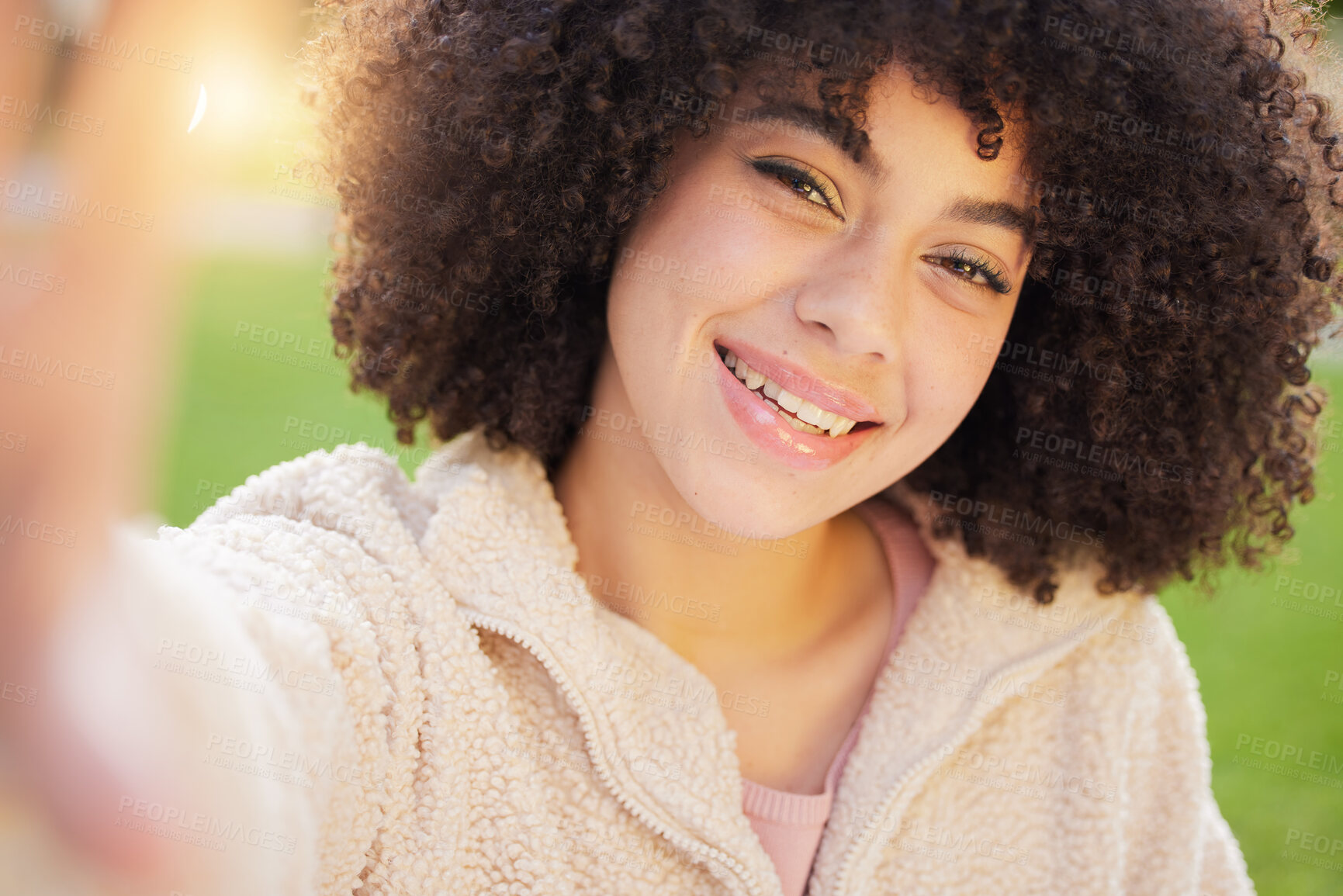 Buy stock photo Woman, portrait and smile for selfie with confidence outside in nature with closeup. Student, campus and college with spontaneous picture for social media with happiness, afro and positive in London