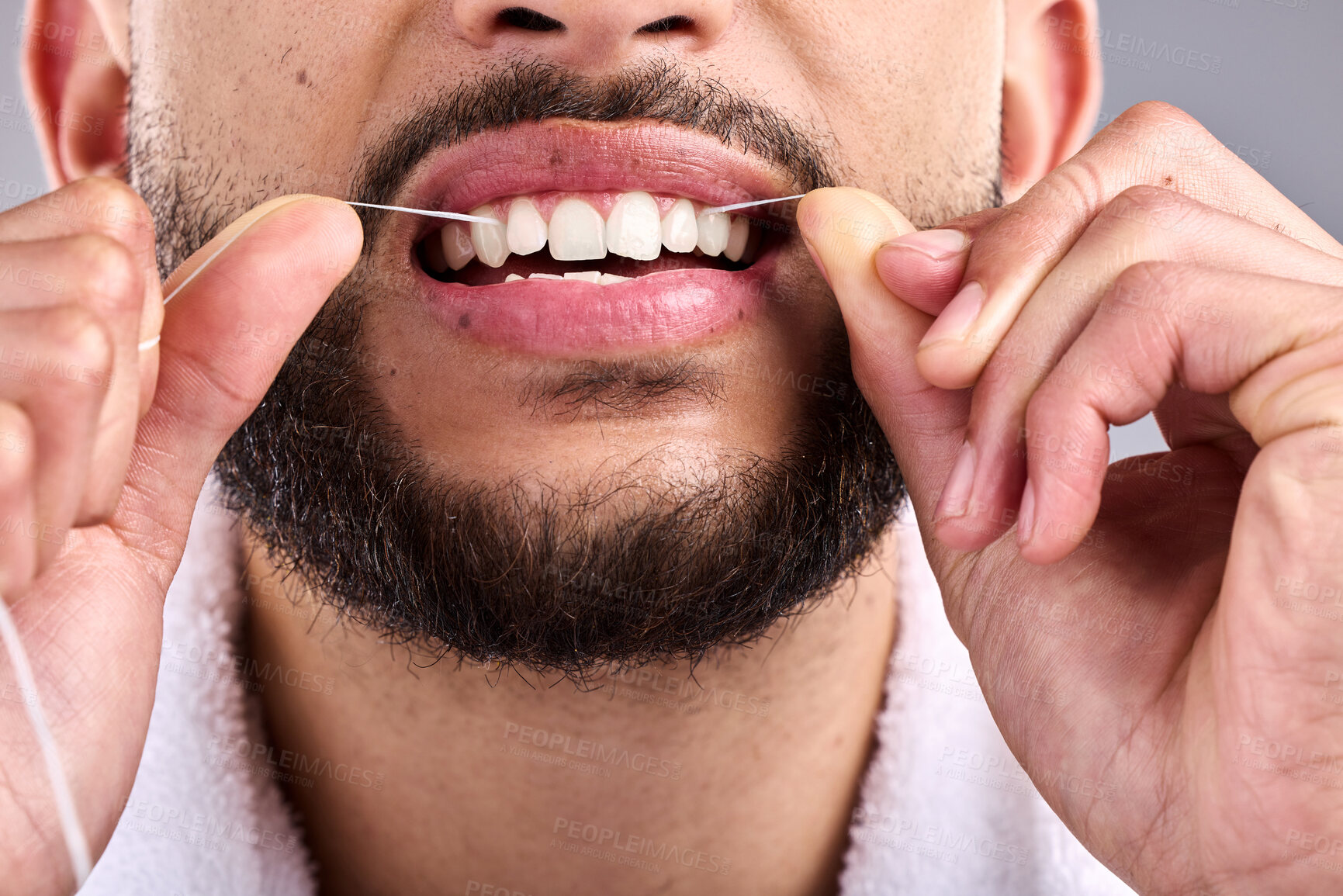 Buy stock photo Mouth, man and flossing teeth for dental health in studio isolated on a white background. Closeup, floss and male model cleaning tooth for oral wellness, hygiene and healthy product for fresh breath.