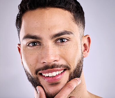 Buy stock photo Beauty, portrait and smile with man in studio on gray background for beard, facial or skincare. Aesthetic, face and wellness with happy model touching skin for dermatology, grooming or hygiene