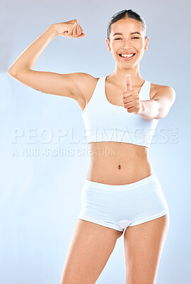 Buy stock photo Fitness, portrait and thumbs up with woman in underwear on studio gray background for health or success. Arm, bicep and exercise with hand gesture of athlete for motivation, support or thank you