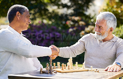 Buy stock photo Chess, handshake and men winning, success or thank you for congratulations with friends at park outdoor. Play board game, shaking hands and senior people at garden for strategy, victory and welcome