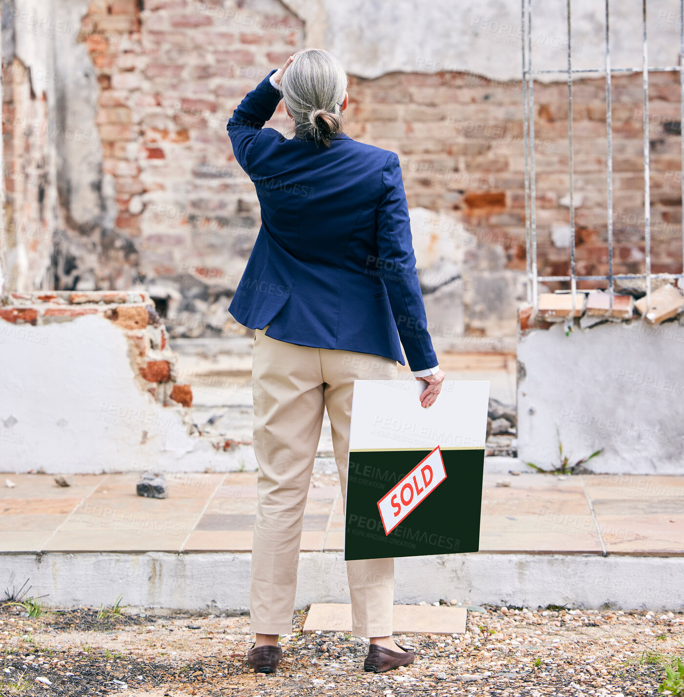 Buy stock photo Woman, back and building outdoor for real estate, property and house with accident, problem and business debt. Realtor, frustrated and disaster with asset by fire or vandalism for corporate sabotage 