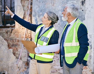 Buy stock photo Shot of two engineers working on a site