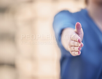 Buy stock photo Shot of a businesswoman with her hand outstretched for a handshake