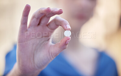 Buy stock photo Shot of a businesswoman holding a vitamin pill