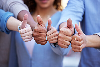 Buy stock photo Hands, thumbs up and team building with business people in agreement, unity or solidarity together outdoor. Thank you, motivation and support with a group of colleagues or employees standing outside