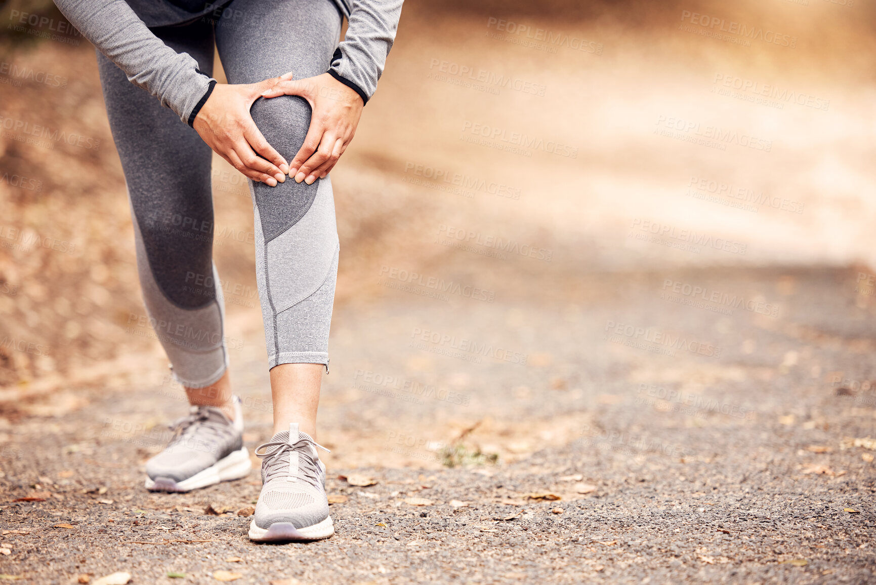 Buy stock photo Hands, knee pain and runner in nature, person or injury in training for fitness, health and mock up space. Athlete, joint or accident with burnout on countryside for exercise, wellness or emergency