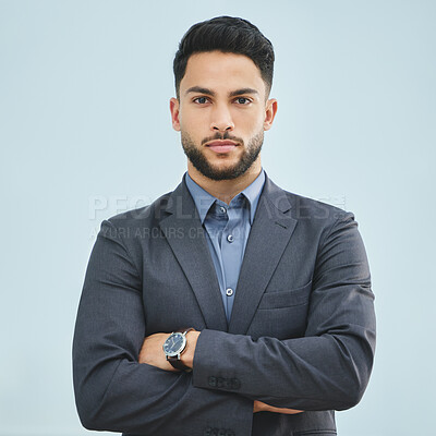 Buy stock photo Crossed arms, serious and portrait of businessman in studio with pride, confidence and legal career. Professional, corporate and male attorney from Colombia in suit for law by gray background.