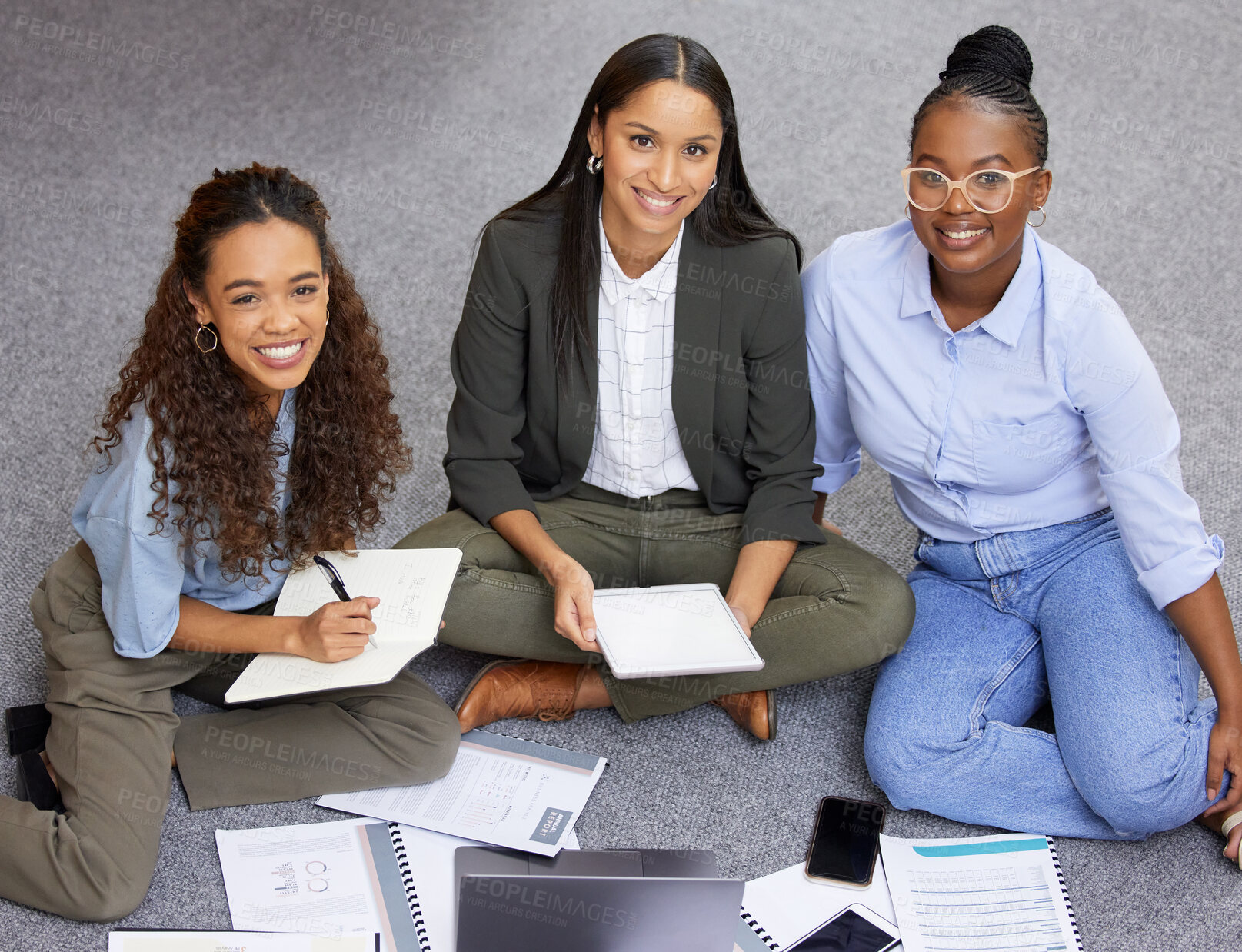Buy stock photo Shot of a team of businesswomen working together during a meeting