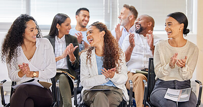 Buy stock photo Shot of a team of business people applauding during a meeting