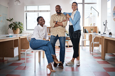 Buy stock photo Portrait of a confident group of businesspeople working in a modern office