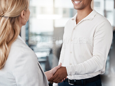 Buy stock photo Happy, business people and hiring with handshake for meeting, greeting or agreement at office. Young businessman and woman shaking hands in teamwork for b2b, deal or partnership together at workplace