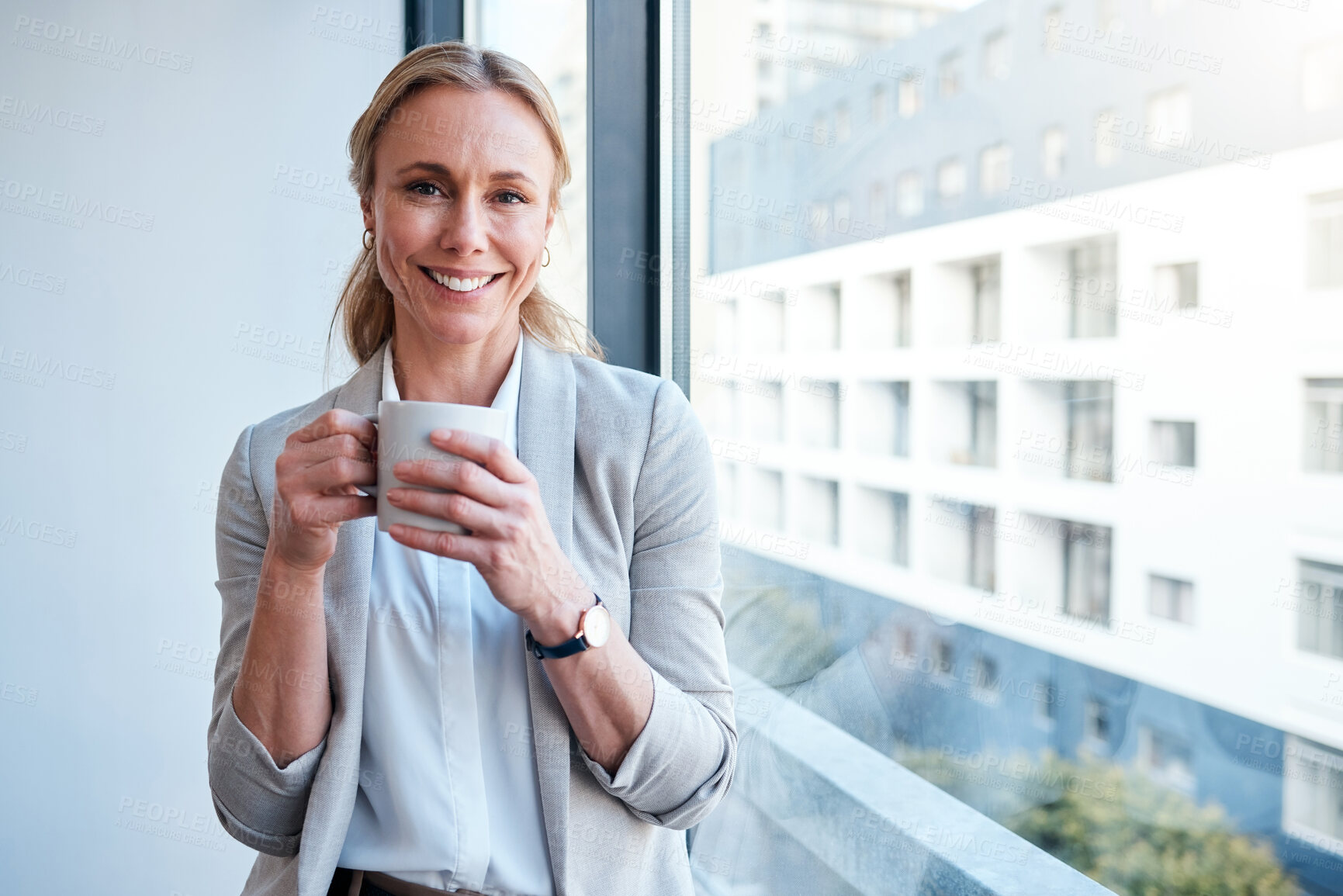 Buy stock photo Coffee, window and portrait of business woman in office with beverage, drink and caffeine in morning. Corporate worker, professional and happy person to start day at job, career and relax working