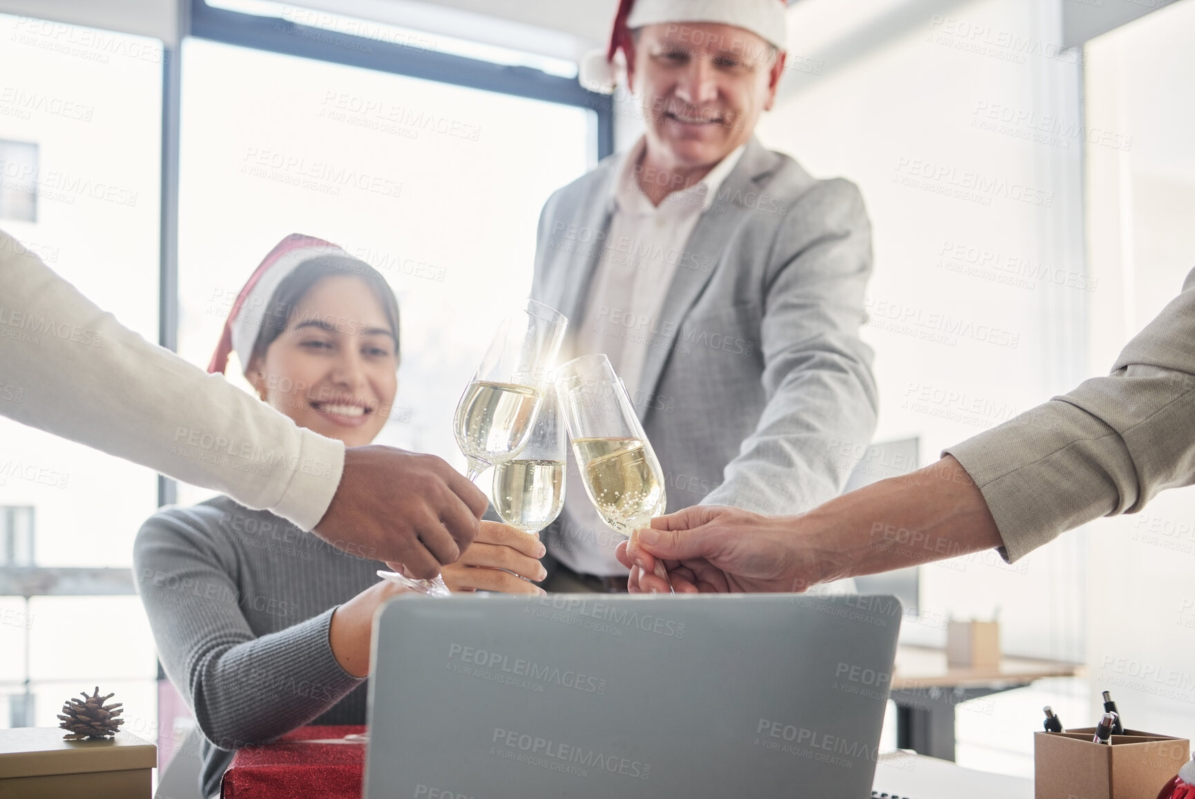 Buy stock photo Business people, Christmas and toast champagne in office with celebration, party and happy for event. Woman, man and group with glasses, cheers and alcohol by laptop with xmas party at workplace