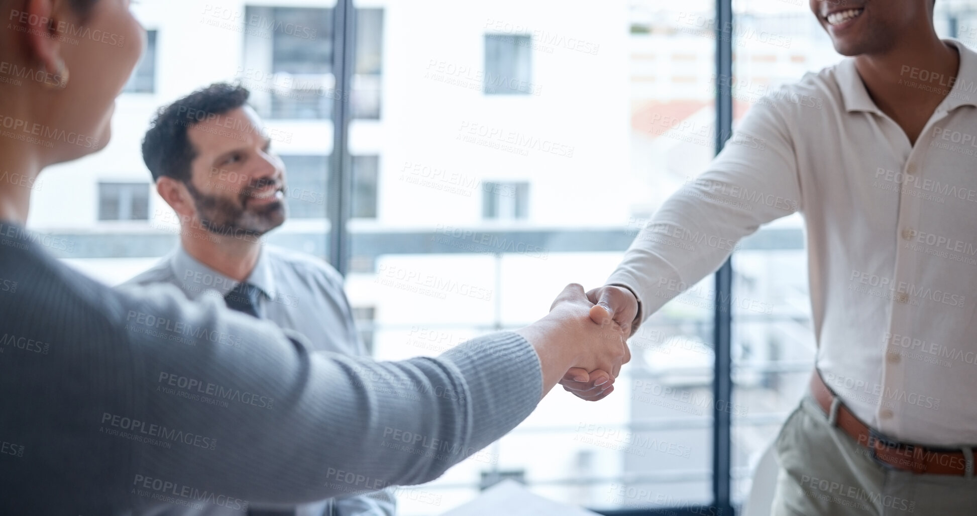 Buy stock photo Meeting, handshake and business people in office for interview, welcome or onboarding for collaboration. Partnership, men and woman shaking hands in conference room for agreement, consulting or deal.