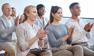 Buy stock photo Cropped shot of a diverse group of businesspeople applauding while sitting in the conference room