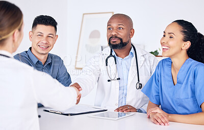 Buy stock photo Handshake, teamwork or happy doctors in meeting for success, medical surgery contract or healthcare goals. Partnership, trusted black man or happy woman shaking hands with a nurse in hospital office