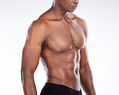 Buy stock photo Black man, shirtless and muscular with abs, healthy and wellness on white studio background. African person, bodybuilder and model with muscle, torso and stomach with confidence, macho or athlete