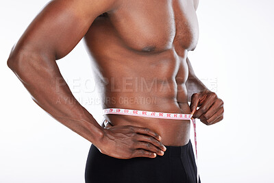 Buy stock photo Check, stomach or hands of man with tape measure for body progress, waist or workout in studio. Muscle, fitness or athlete with abs or six pack in training to lose weight on white background