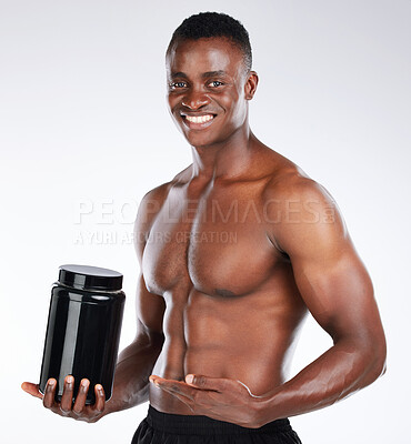 Buy stock photo Portrait, whey protein and black man with fitness, training and wellness on white studio background. African person, bodybuilder or athlete with exercise, health or promotion with container or powder