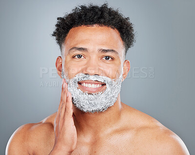 Buy stock photo Man, portrait and shaving cream in studio for skincare, foam and grooming routine on gray background. Male person, smile and cosmetic for hair removal product, beauty and facial treatment for hygiene