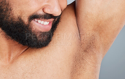 Buy stock photo Man, studio and smell odor on armpit, hygiene and topless for clean scent on gray background. Male person, shirtless and underarm for cologne aroma, deodorant and satisfaction for perfume in closeup