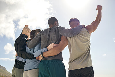 Buy stock photo Rearview shot of a group of sporty young people cheering while exercising outdoors
