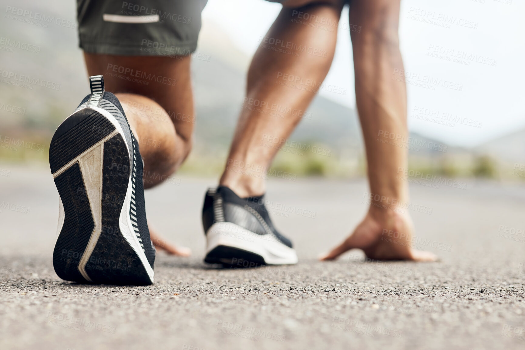 Buy stock photo Cropped shot of a sporty young man in starting position