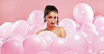 Pretty cool in her balloon-filled pool
