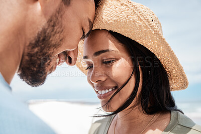 Buy stock photo Closeup shot of an affectionate couple standing on the beach