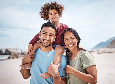 Buy stock photo Shot of a man spending time at the beach with his son