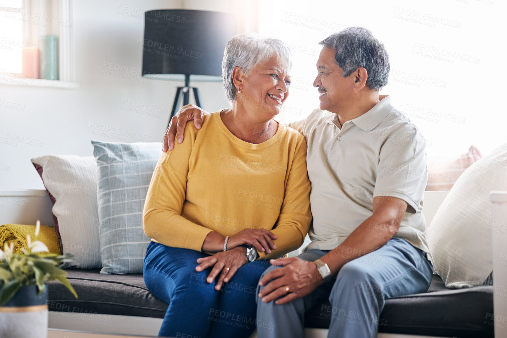 Buy stock photo Shot of a senior couple relaxing at home