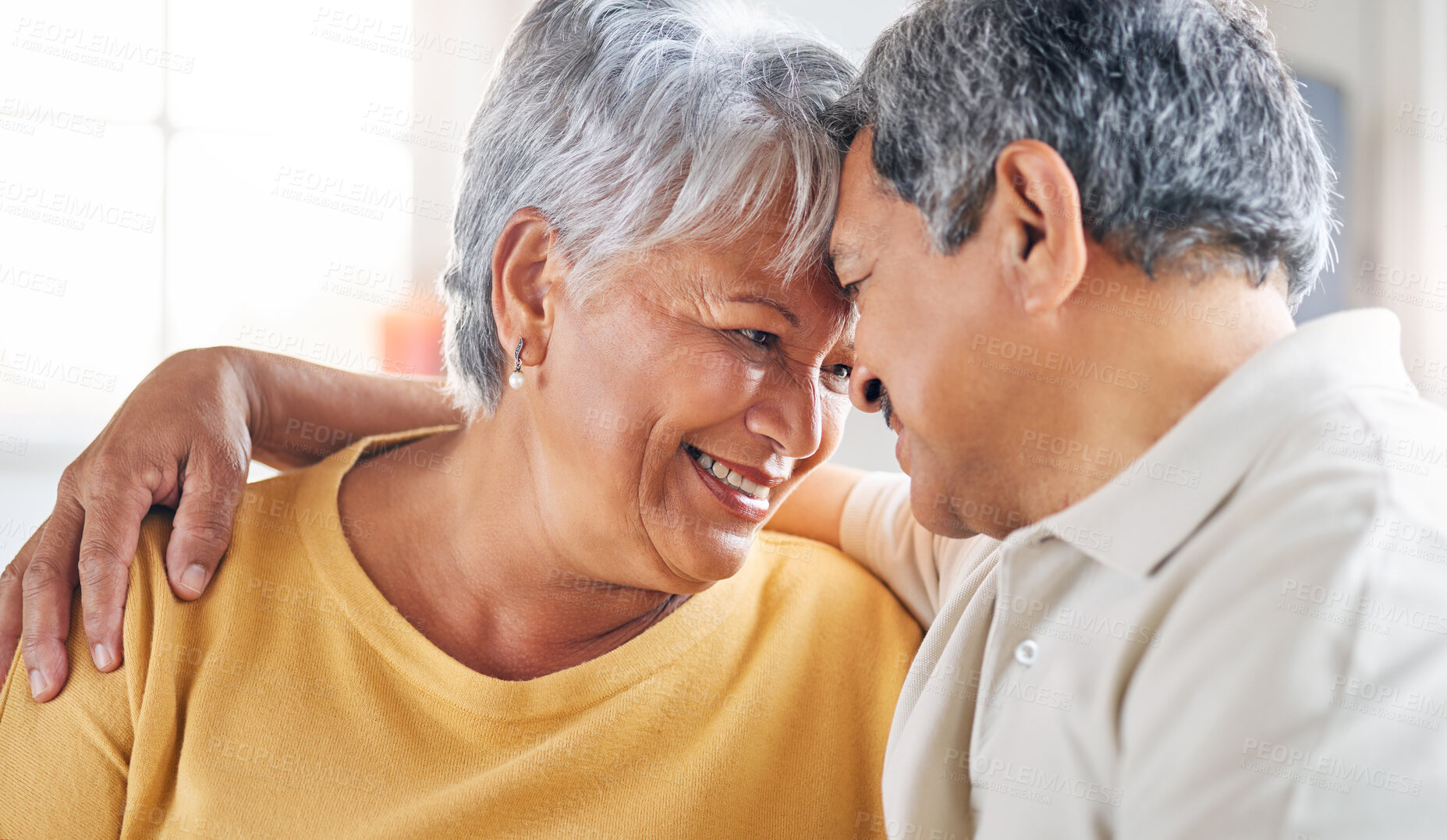 Buy stock photo Shot of a senior couple relaxing at home