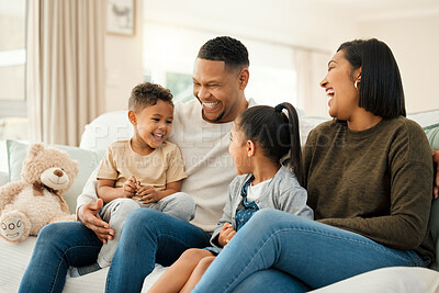 Buy stock photo Happy, family and relax with laughing at house for love, care and bonding support of joke in living room together. Smile, parents and kids with embrace for  funny weekend, playful morning and memory