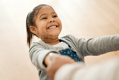 Buy stock photo Parent, daughter and holding hands in dance in home together with love, bonding and care with smile. Family. dancer and guardian with girl child in living room for movement, celebration or happiness