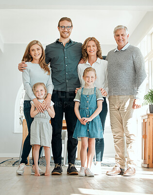Buy stock photo Full length shot of a family standing together during a relaxing day at home