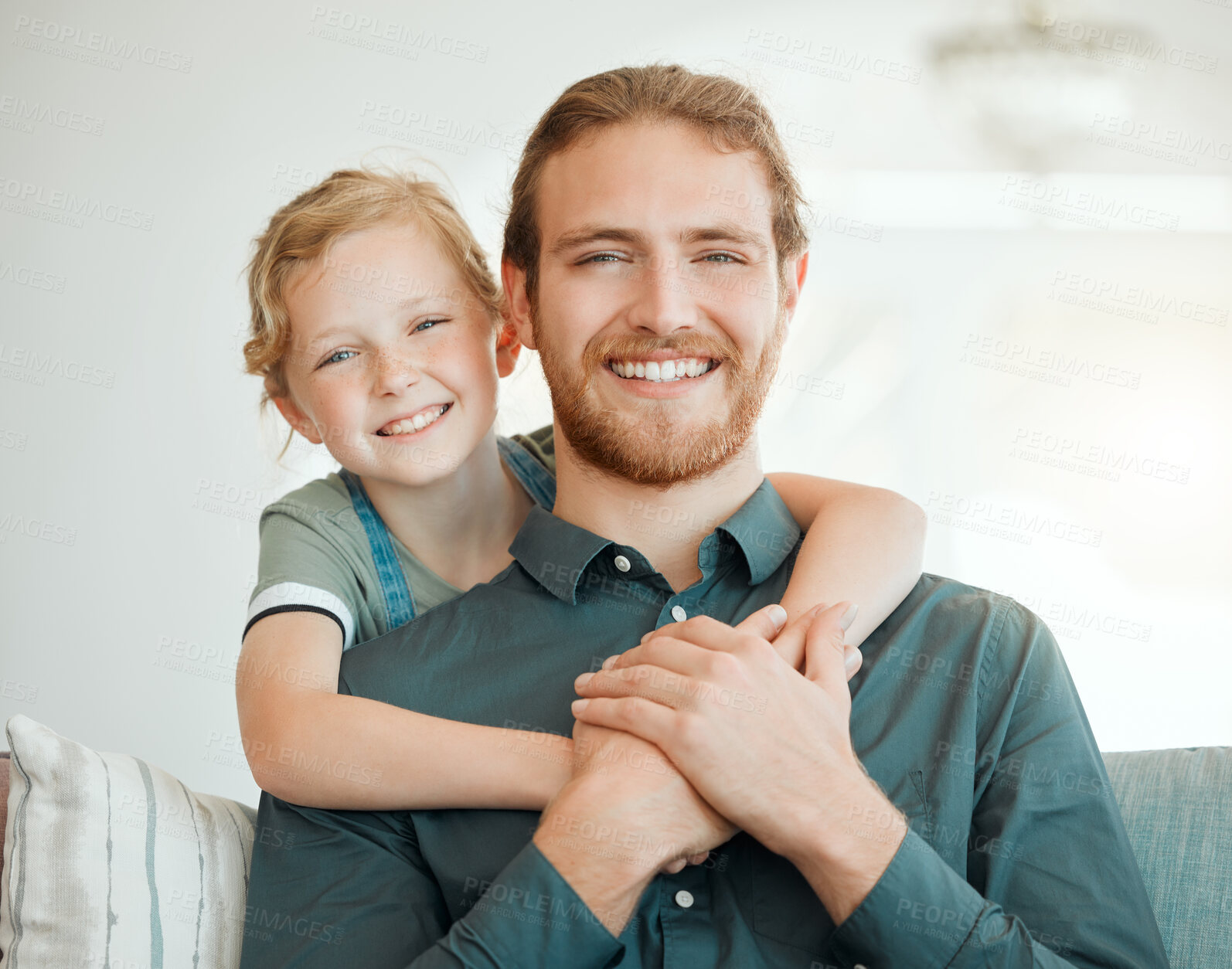 Buy stock photo Girl, dad and smile on sofa with portrait for father and daughter bonding on weekend with childhood love. Parent, kid and happy together in family house with hug or affection, care and relax on couch